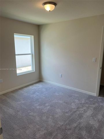 9114 Aegean Circle, Lehigh Acres, FL 33936