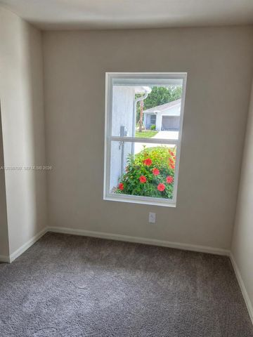 9114 Aegean Circle, Lehigh Acres, FL 33936