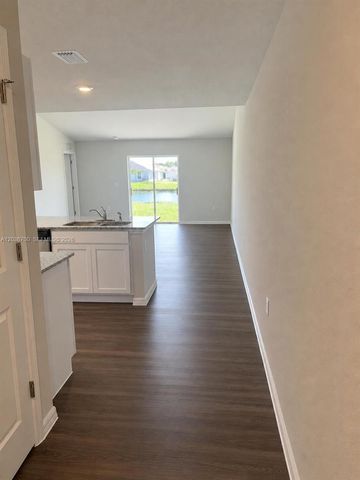 9114 Aegean Circle, Lehigh Acres, FL 33936