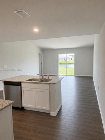9114 Aegean Circle, Lehigh Acres, FL 33936