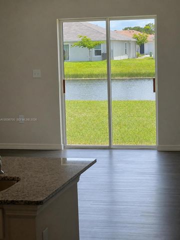 9114 Aegean Circle, Lehigh Acres, FL 33936