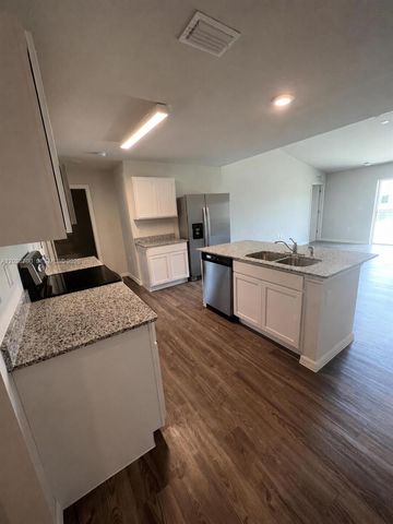 9114 Aegean Circle, Lehigh Acres, FL 33936