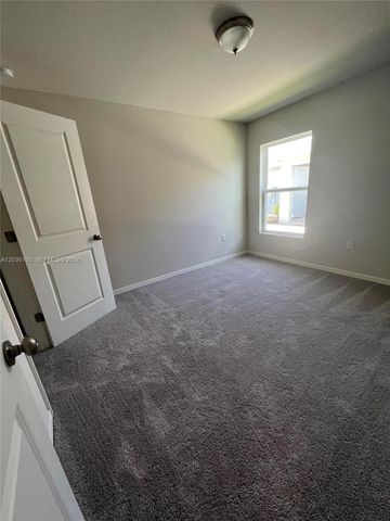 9114 Aegean Circle, Lehigh Acres, FL 33936