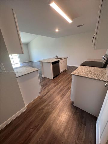 9114 Aegean Circle, Lehigh Acres, FL 33936