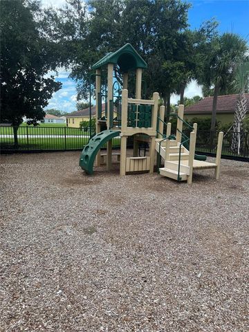9114 Aegean Circle, Lehigh Acres, FL 33936