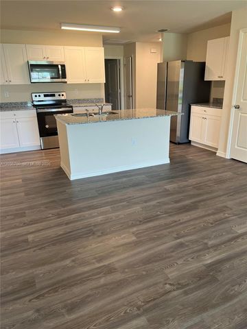 9114 Aegean Circle, Lehigh Acres, FL 33936