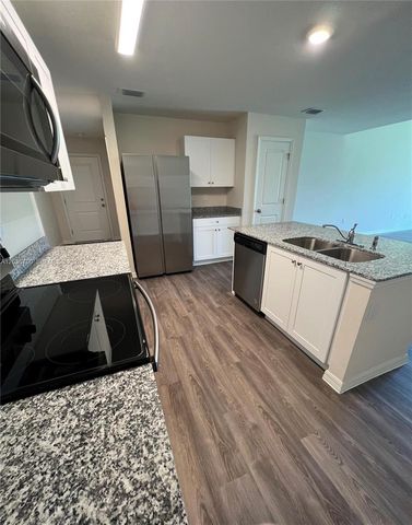 9114 Aegean Circle, Lehigh Acres, FL 33936