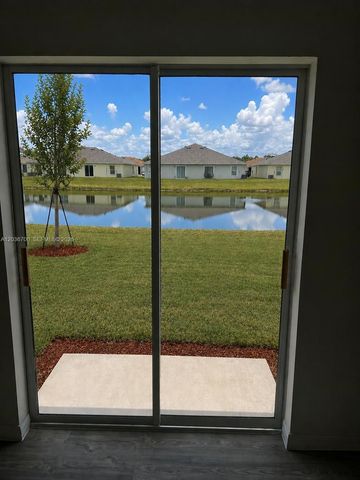 9114 Aegean Circle, Lehigh Acres, FL 33936