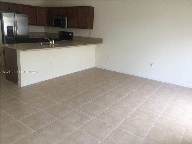 9307 W 33rd Way, Hialeah, FL 33018