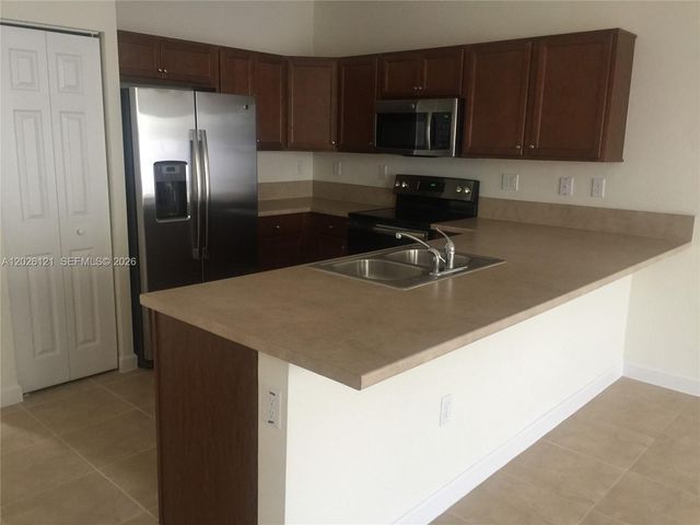 9307 W 33rd Way, Hialeah, FL 33018