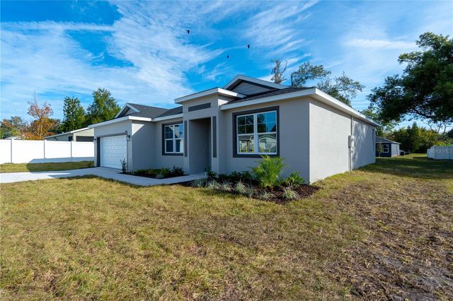 834 N JOANNA AVENUE, Tavares, FL 32778
