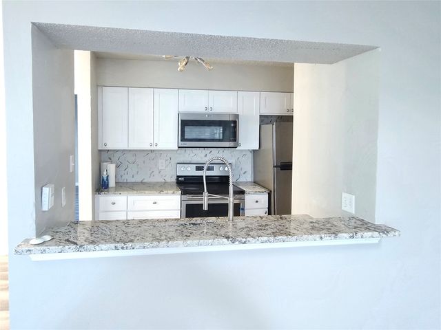 5616 Preston Oaks Road 202, Dallas, TX 75254
