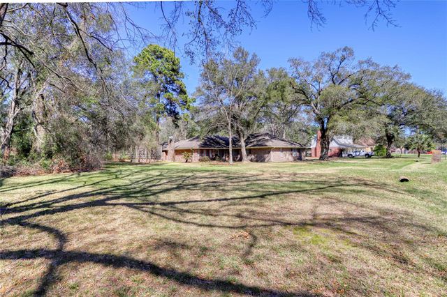 11234 Champion Wood Drive, Tomball, TX 77375