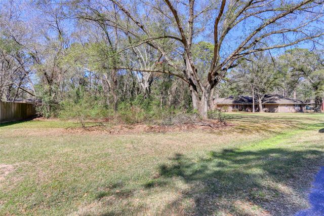 11234 Champion Wood Drive, Tomball, TX 77375