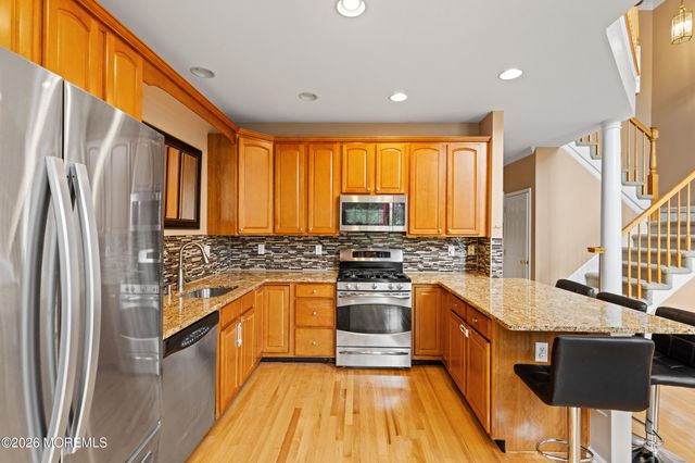 90 Deepwater Circle, Manalapan, NJ 07726
