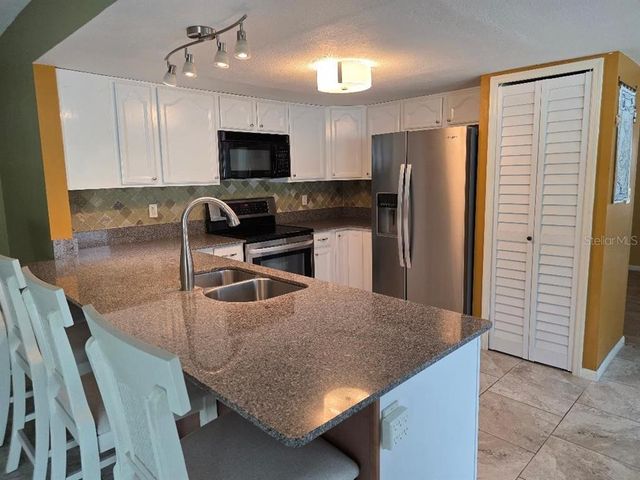 11932 99TH AVE AVENUE N, Seminole, FL 33772