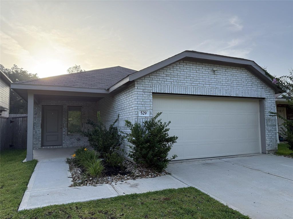 529 Falling Cave Drive, Willis, TX 77378