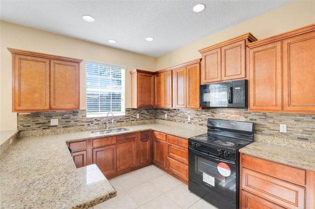 413 SPLIT OAK COURT, Eustis, FL 32736