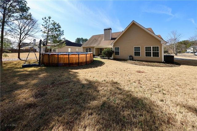 918 Golden Meadows Lane, Loganville, GA 30052