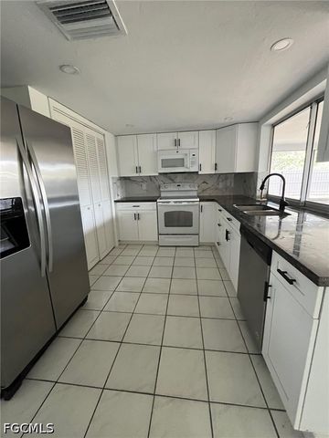 1402 SE 34 ST, Cape Coral, FL 33904