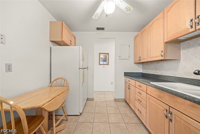 16 Dawn Flower CIR, Lehigh Acres, FL 33936