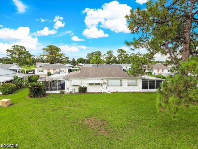 16 Dawn Flower CIR, Lehigh Acres, FL 33936