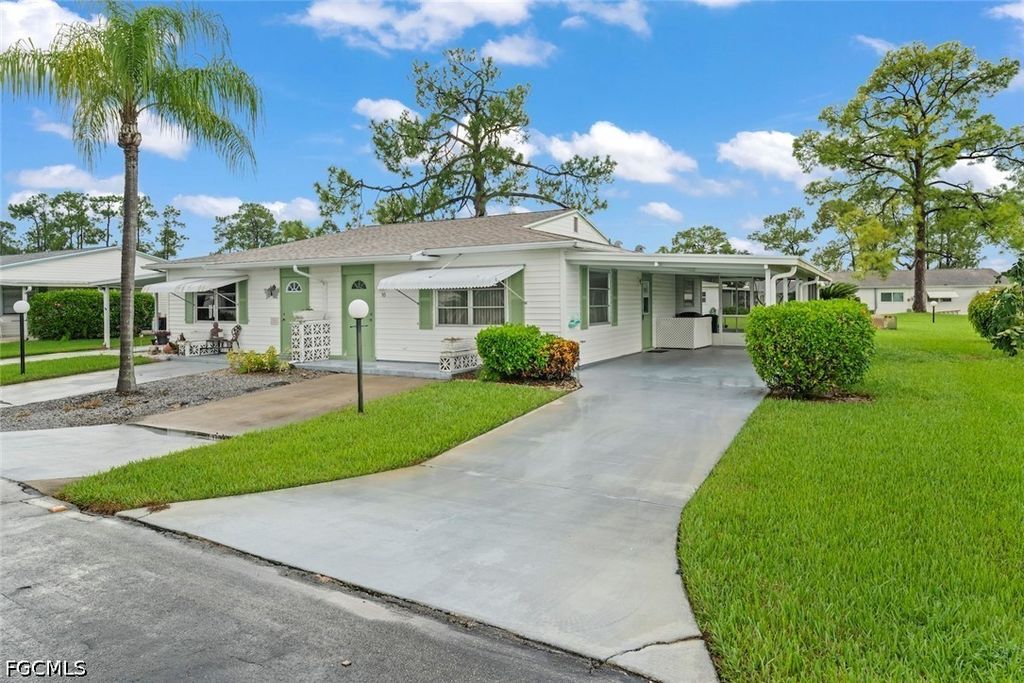 16 Dawn Flower CIR, Lehigh Acres, FL 33936
