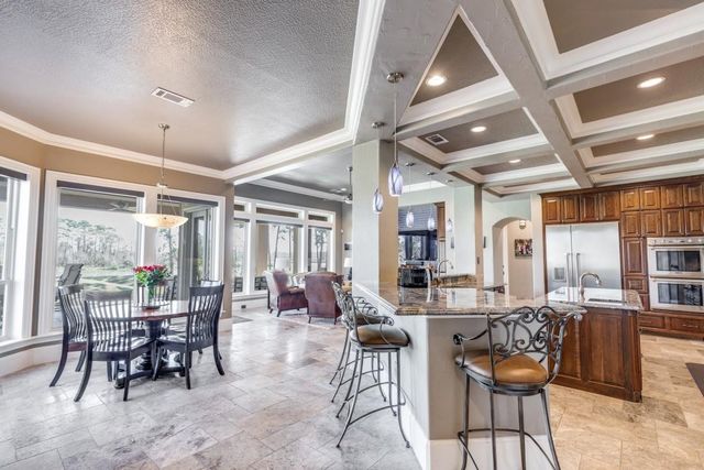 4 Island Green Court, Kingwood, TX 77339