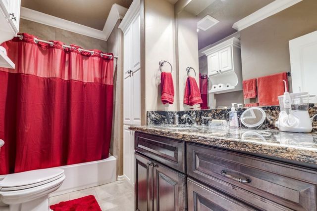 4 Island Green Court, Kingwood, TX 77339