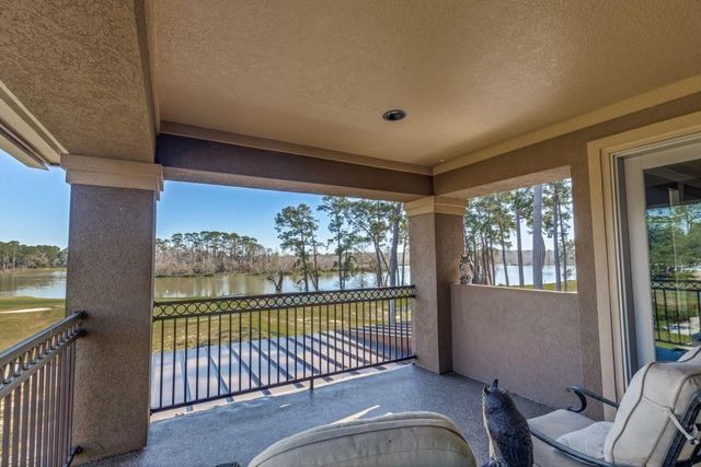 4 Island Green Court, Kingwood, TX 77339