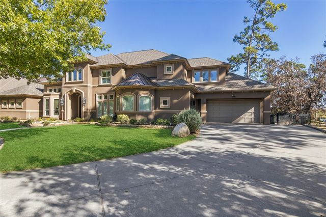 4 Island Green Court, Kingwood, TX 77339