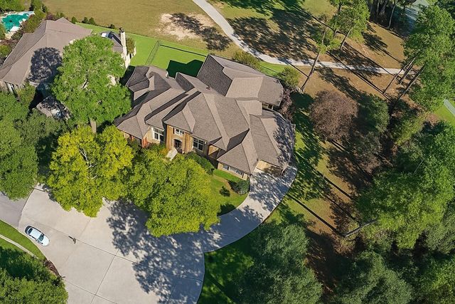 4 Island Green Court, Kingwood, TX 77339