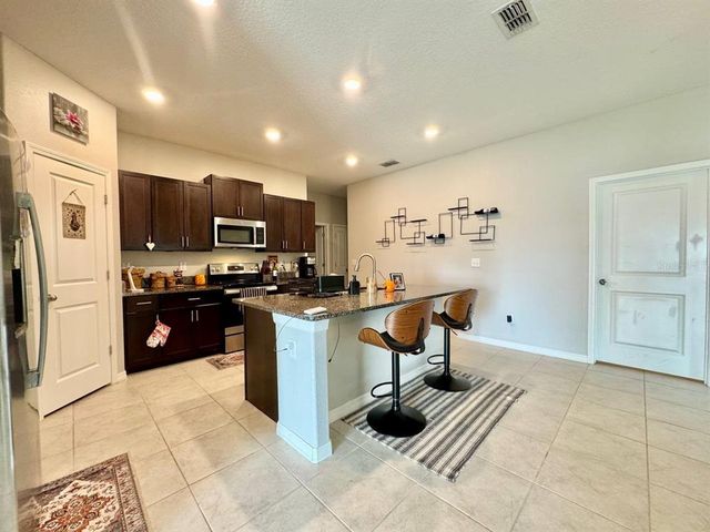 15607 CHARR ISLAND STREET, Sun City Center, FL 33573