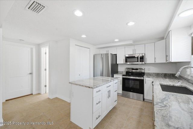 7527 Hatteras Drive, Hudson, FL 34667