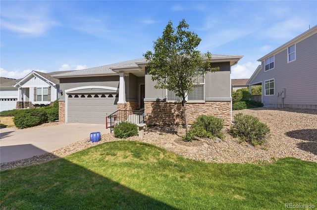 1520 Red Poppy Way, Brighton, CO 80601