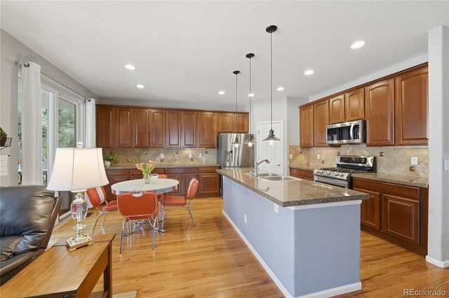 1520 Red Poppy Way, Brighton, CO 80601