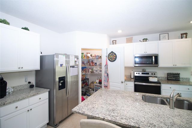 3033 BEAU LOOP, Tavares, FL 32778