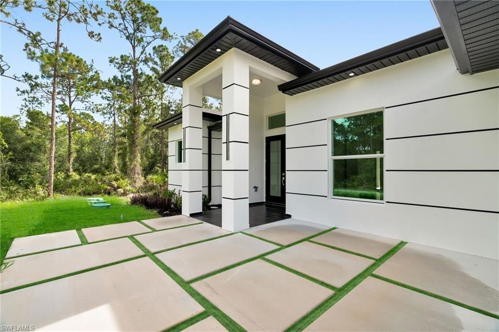 1021 Moore AVE, LEHIGH ACRES, FL 33972 — exterior