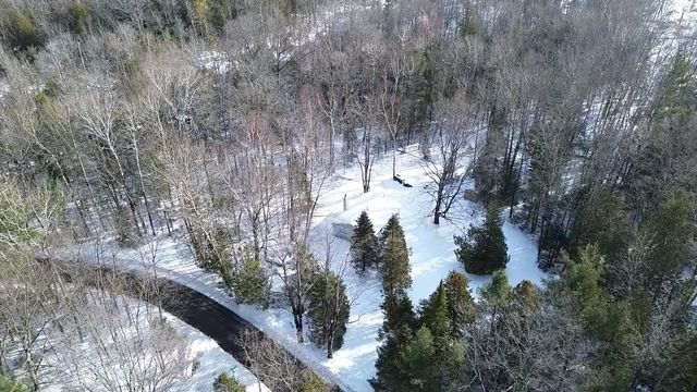 12851 Manitou Trail, Kewadin, MI 49648