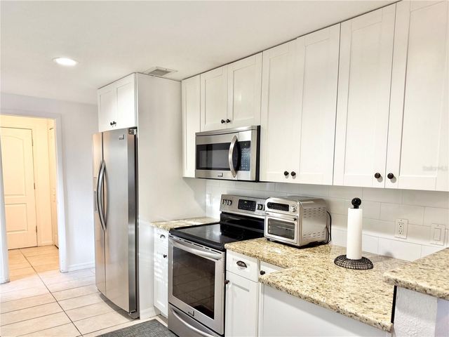 1004 LAKE CHARLES CIRCLE, Lutz, FL 33548