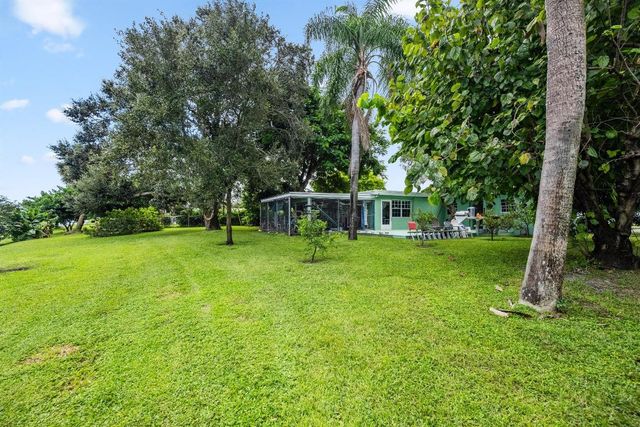 6400 Carambola Circle, West Palm Beach, FL 33406