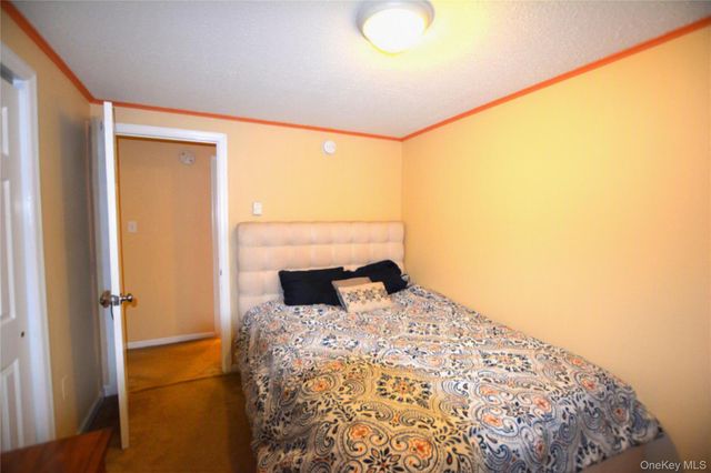 36 Village Circle E, Manorville, NY 11949