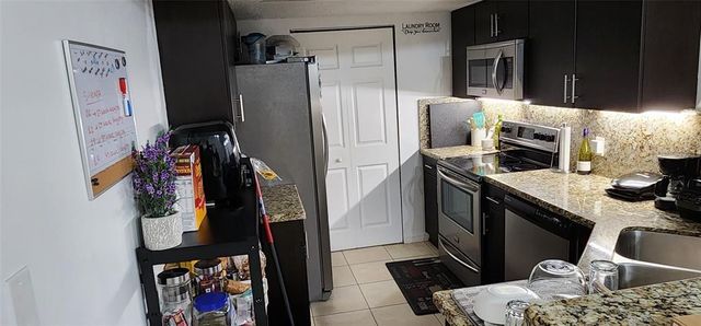 5005 Wiles Road 106, Coconut Creek, FL 33073