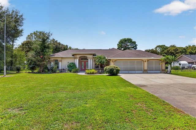 9412 GROUSE WAY, Hudson, FL 34669
