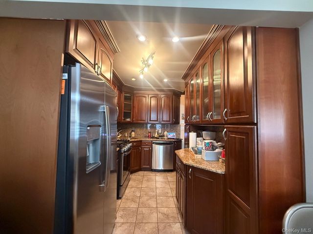 3034 73rd Street, East Elmhurst, NY 11370