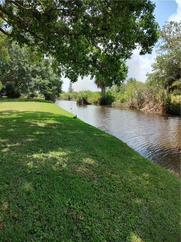 451 Papaya Circle, Barefoot Bay, FL 32976