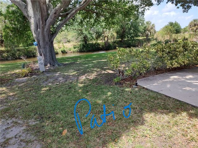 451 Papaya Circle, Barefoot Bay, FL 32976