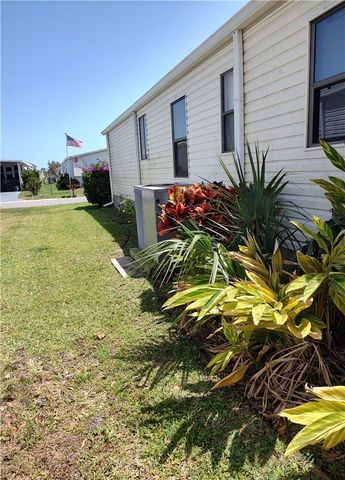 451 Papaya Circle, Barefoot Bay, FL 32976