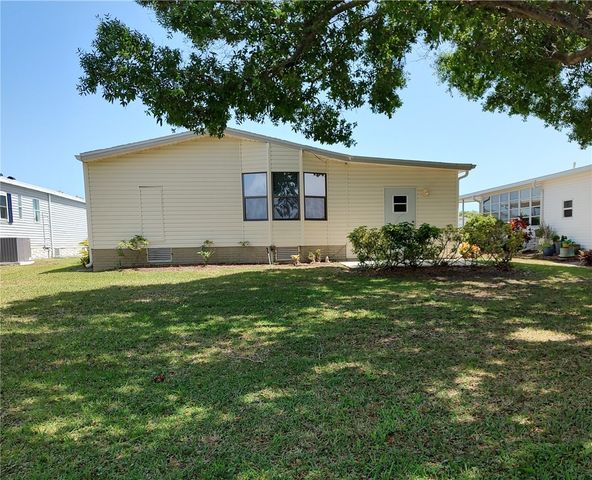 451 Papaya Circle, Barefoot Bay, FL 32976