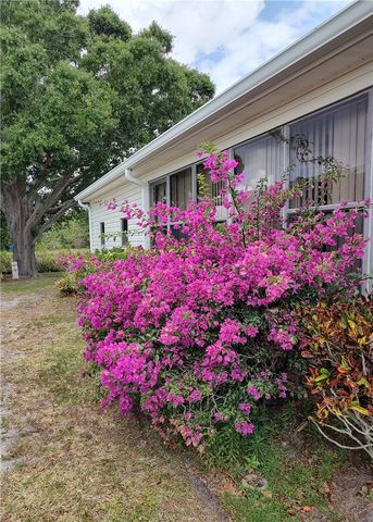 451 Papaya Circle, Barefoot Bay, FL 32976